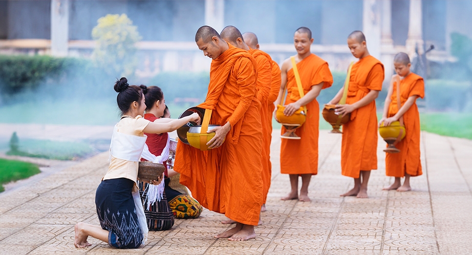 Monks in the early morning, Laos
